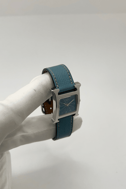 Montre HERMÈS "Heure H" en acier et cuir - Castafiore