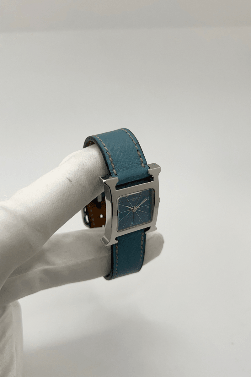 Montre HERMÈS "Heure H" en acier et cuir - Castafiore