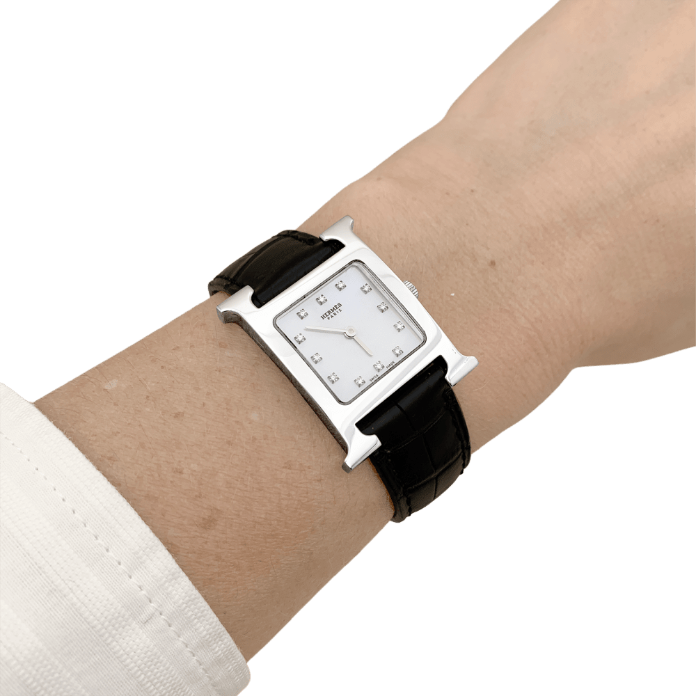 Montre HERMÈS "Heure H" en acier, nacre, cuir et diamants - Castafiore