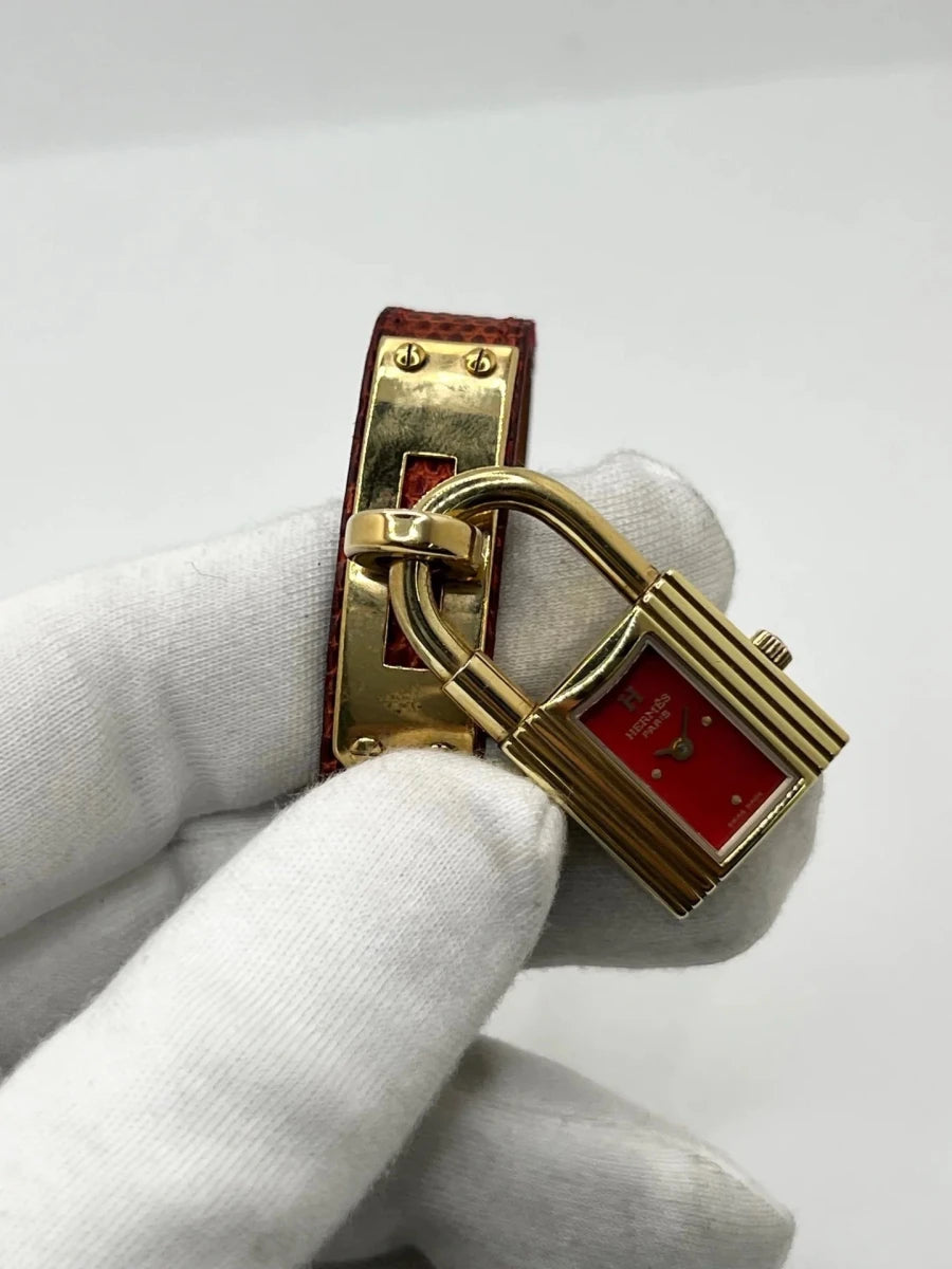 Montre HERMÈS "Kelly" plaqué or, acier et cuir - Castafiore