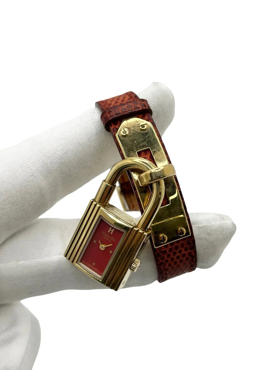 Montre HERMÈS "Kelly" plaqué or, acier et cuir - Castafiore
