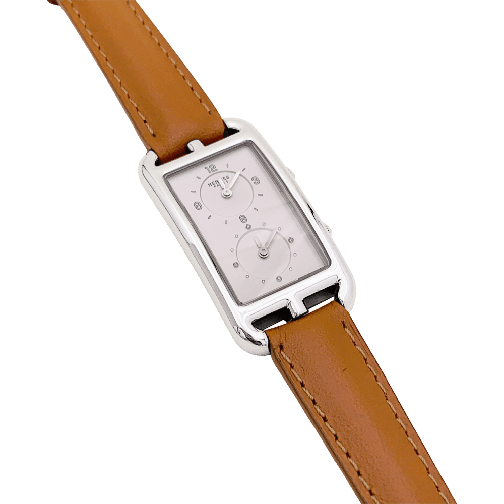 Montre HERMÈS "Nantucket Dual Time" en acier, argent, cuir et diamants - Castafiore