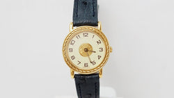 Montre Hermès Sellier en or jaune - Castafiore