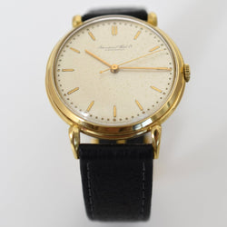 Montre IWC en or jaune et cuir - Castafiore