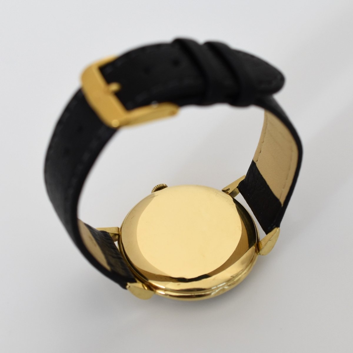 Montre IWC en or jaune et cuir - Castafiore