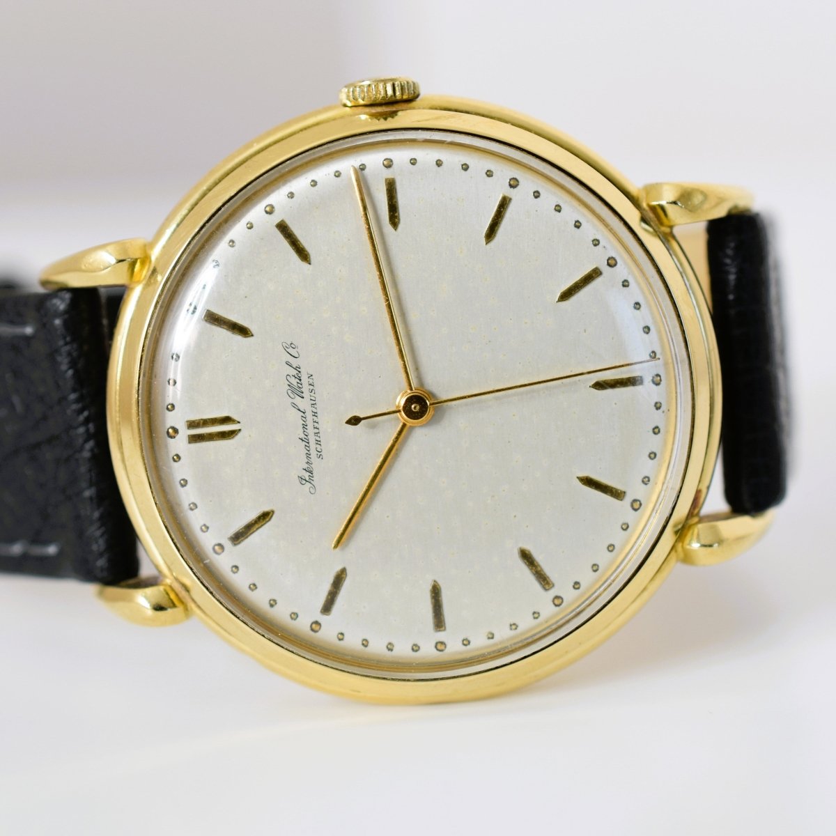 Montre IWC en or jaune et cuir - Castafiore