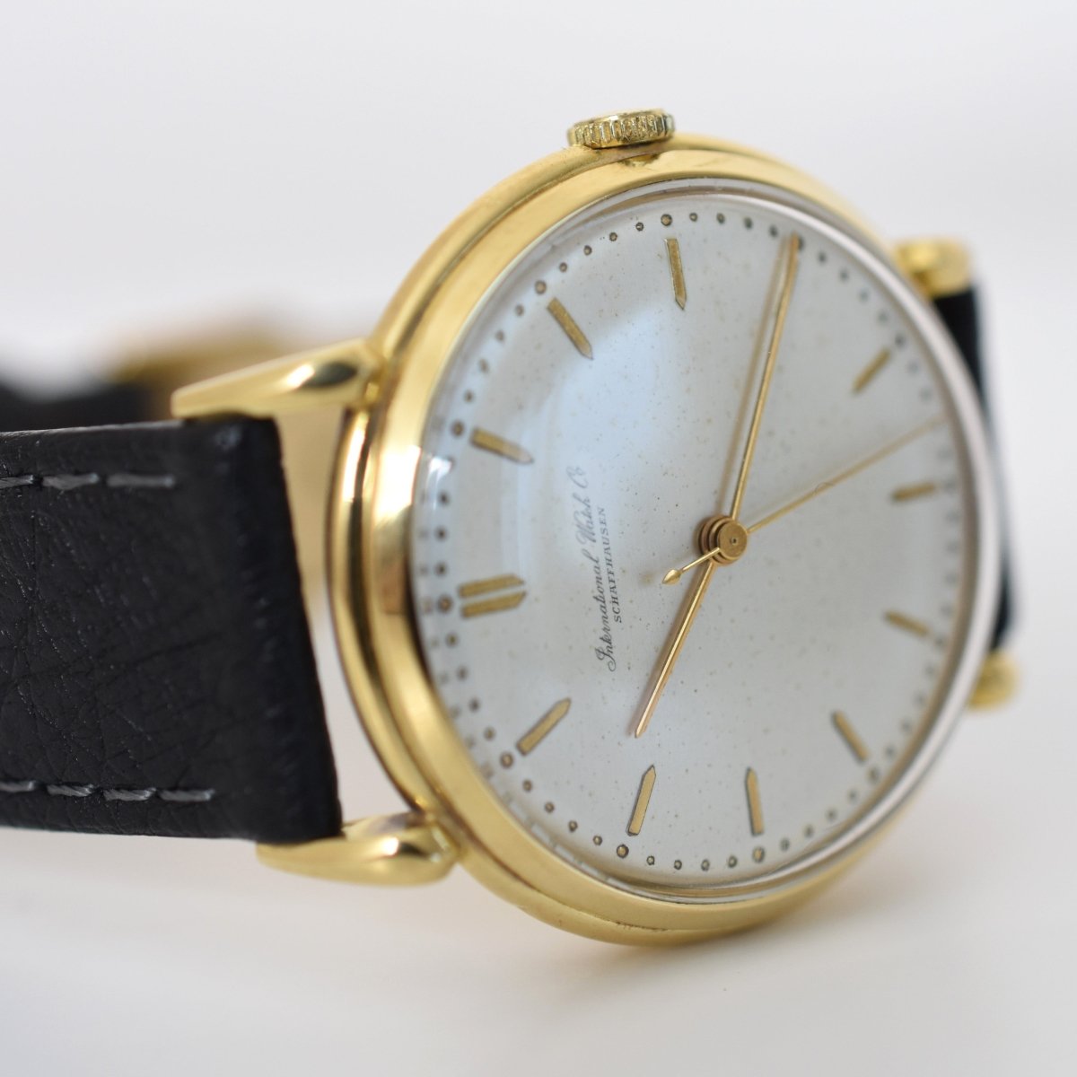 Montre IWC en or jaune et cuir - Castafiore