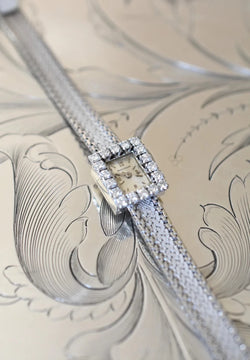 Montre JAEGER-LECOULTRE Haute Joaillerie Cal. 426 en or blanc 18 carats et diamants Bracelet Intégré c.1960. - Castafiore