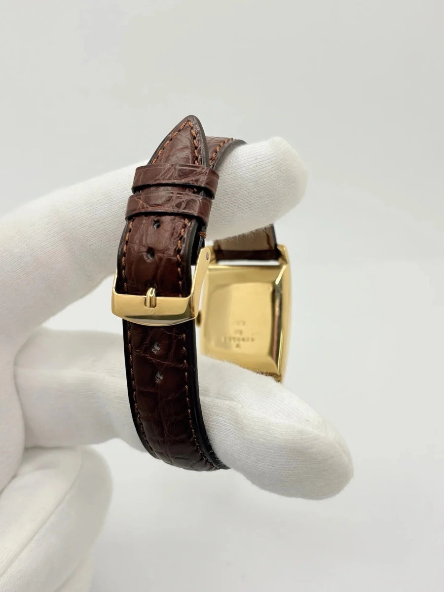 Montre JAEGER-LECOULTRE "Tank Vintage" en or jaune, acier et cuir - Castafiore