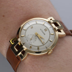 Montre LECOULTRE en or jaune et cuir - Castafiore