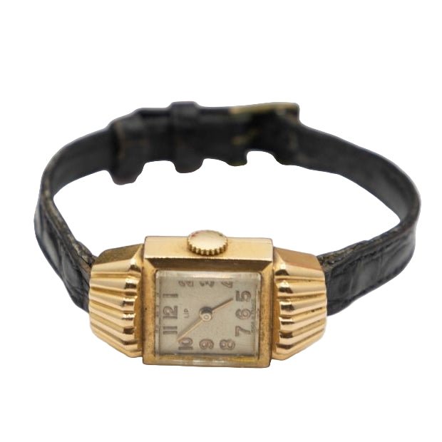 Montre LIP en or jaune et cuir - Castafiore