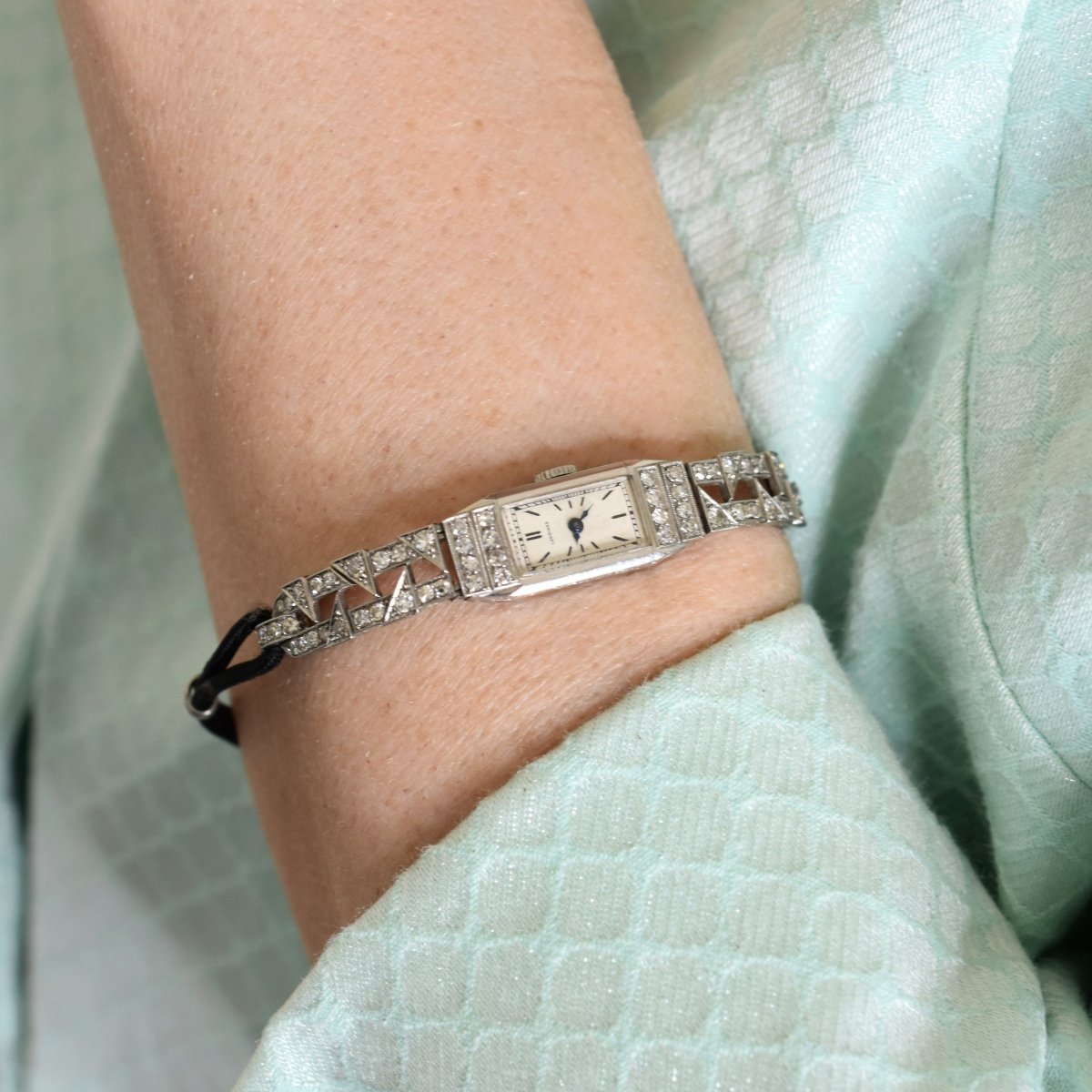 Montre LONGINES en platine, acier et diamants - Castafiore