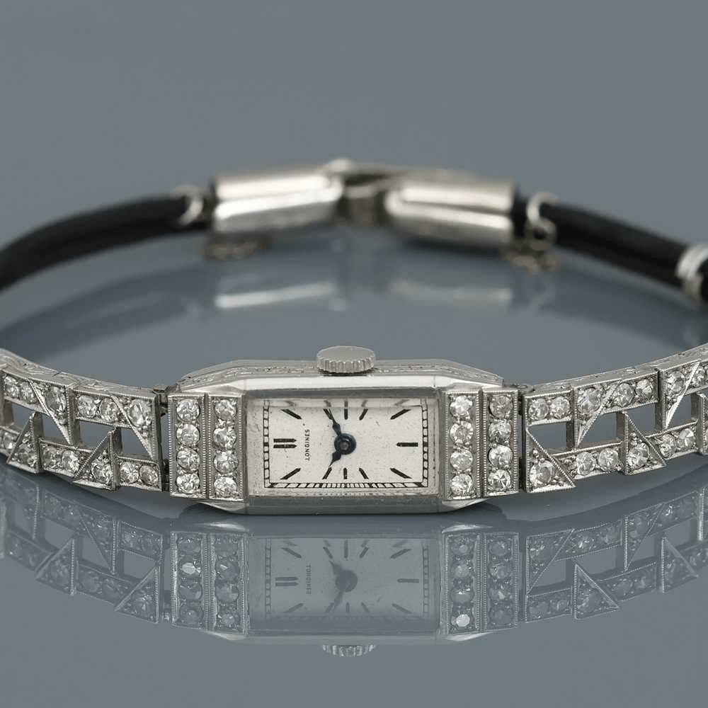 Montre LONGINES en platine, acier et diamants - Castafiore