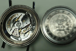 Montre LONGINES "Ultra-Chron" en acier et cuir - Castafiore