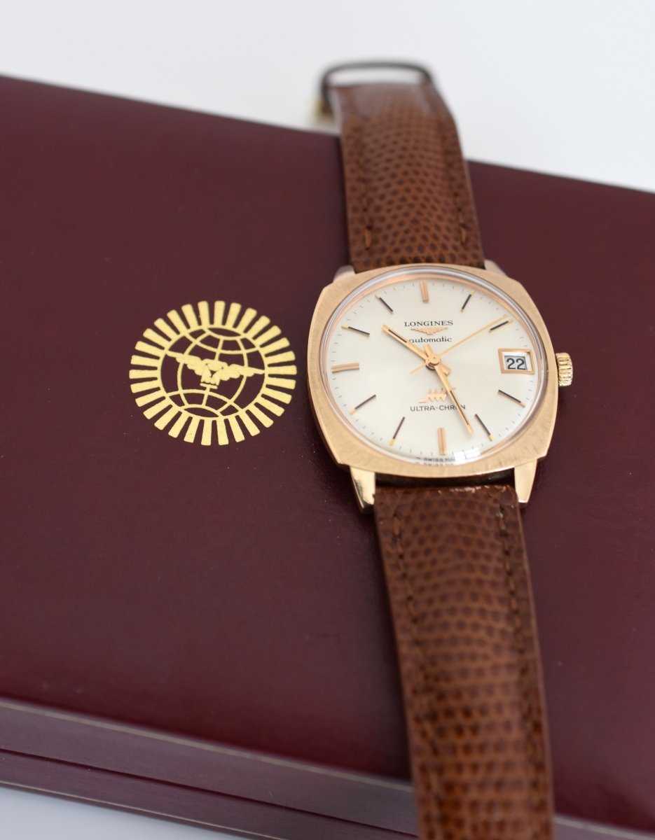 Montre LONGINES "Ultra Chron" en or jaune, argent et cuir - Castafiore