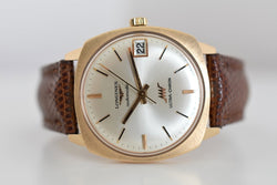 Montre LONGINES Ultra Chron en or jaune, argent et cuir