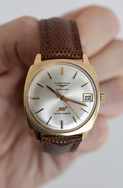 Montre LONGINES Ultra Chron en or jaune, argent et cuir