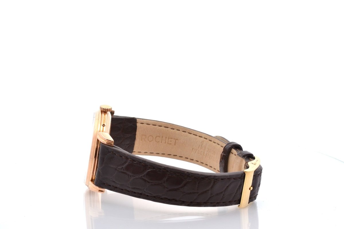 Montre MOVADO "Triple Calendar" en or jaune, plexi et cuir - Castafiore