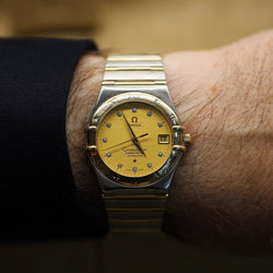 Montre OMEGA "Constellation" en or jaune, acier et automatique - Castafiore