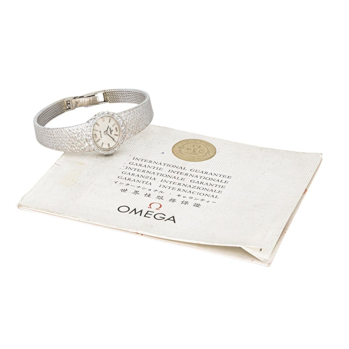 Montre OMEGA "De Ville" en or blanc, argent, saphir et diamant - Castafiore