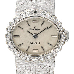 Montre OMEGA "De Ville" en or blanc, argent, saphir et diamant - Castafiore