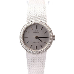 Montre OMEGA "De Ville" en or blanc, saphir et diamants - Castafiore