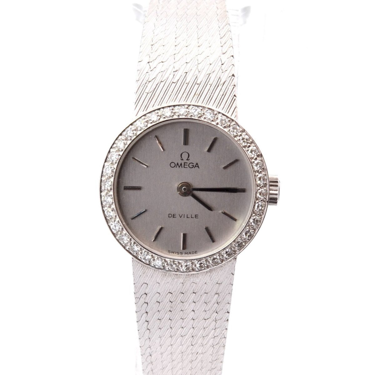 Montre OMEGA "De Ville" en or blanc, saphir et diamants - Castafiore