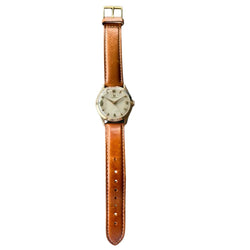 Montre OMÉGA en or jaune et cuir - Castafiore