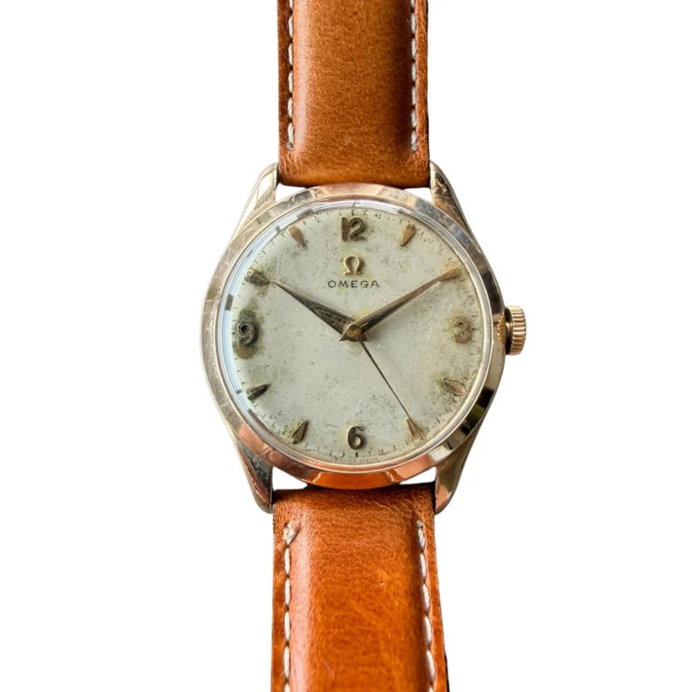 Montre OMÉGA en or jaune et cuir - Castafiore
