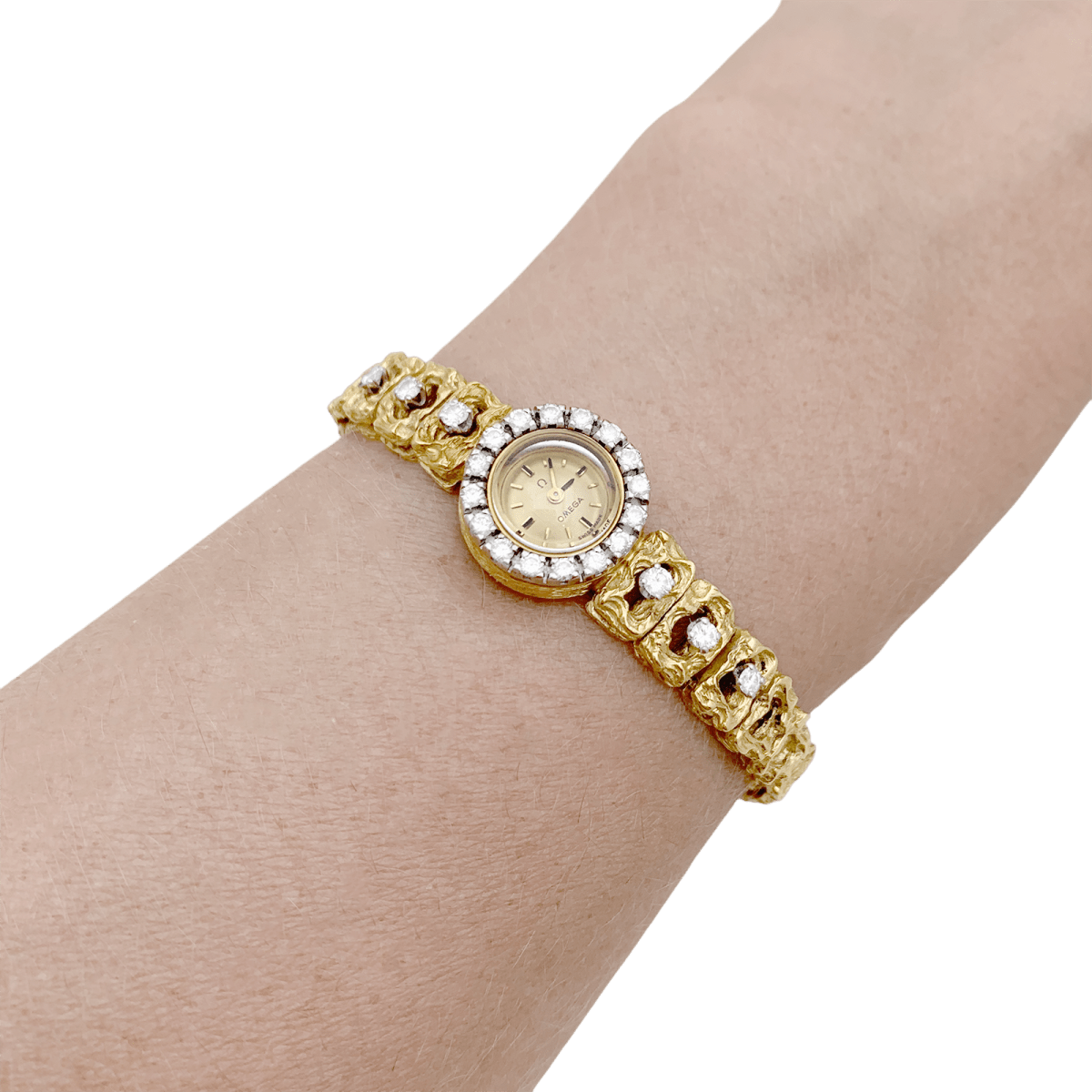 Montre OMEGA en or jaune, or blanc et diamants - Castafiore