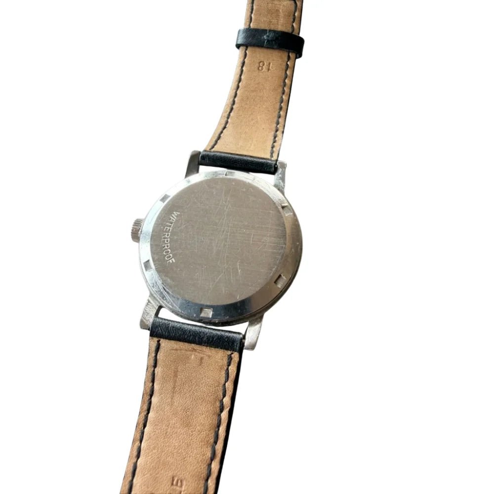 Montre OMÉGA GENÈVE en acier et cuir - Castafiore
