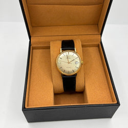 Montre OMÉGA "Genève" en or jaune, acier et cuir - Castafiore