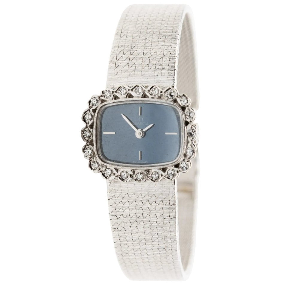 Montre OMEGA or blanc et diamants - Castafiore