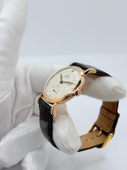 Montre OMÉGA "Vintage" en or rose, acier et cuir - Castafiore