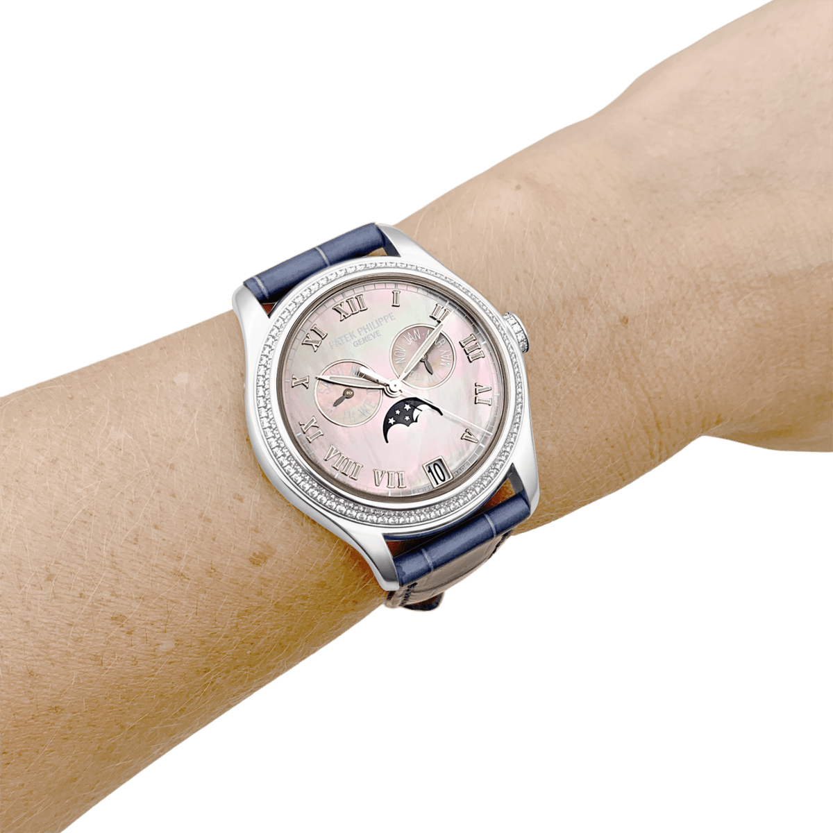Montre PATEK PHILIPPE "Annual Calendar" en or blanc, cuir et diamants - Castafiore