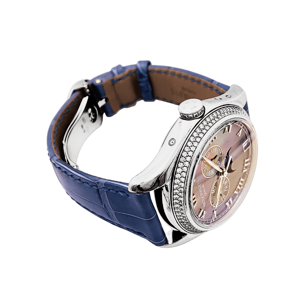 Montre PATEK PHILIPPE "Annual Calendar" en or blanc, cuir et diamants - Castafiore