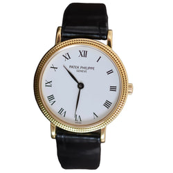 Montre PATEK PHILIPPE "Calatrava Clous de Paris" en or jaune, cuir et quartz - Castafiore