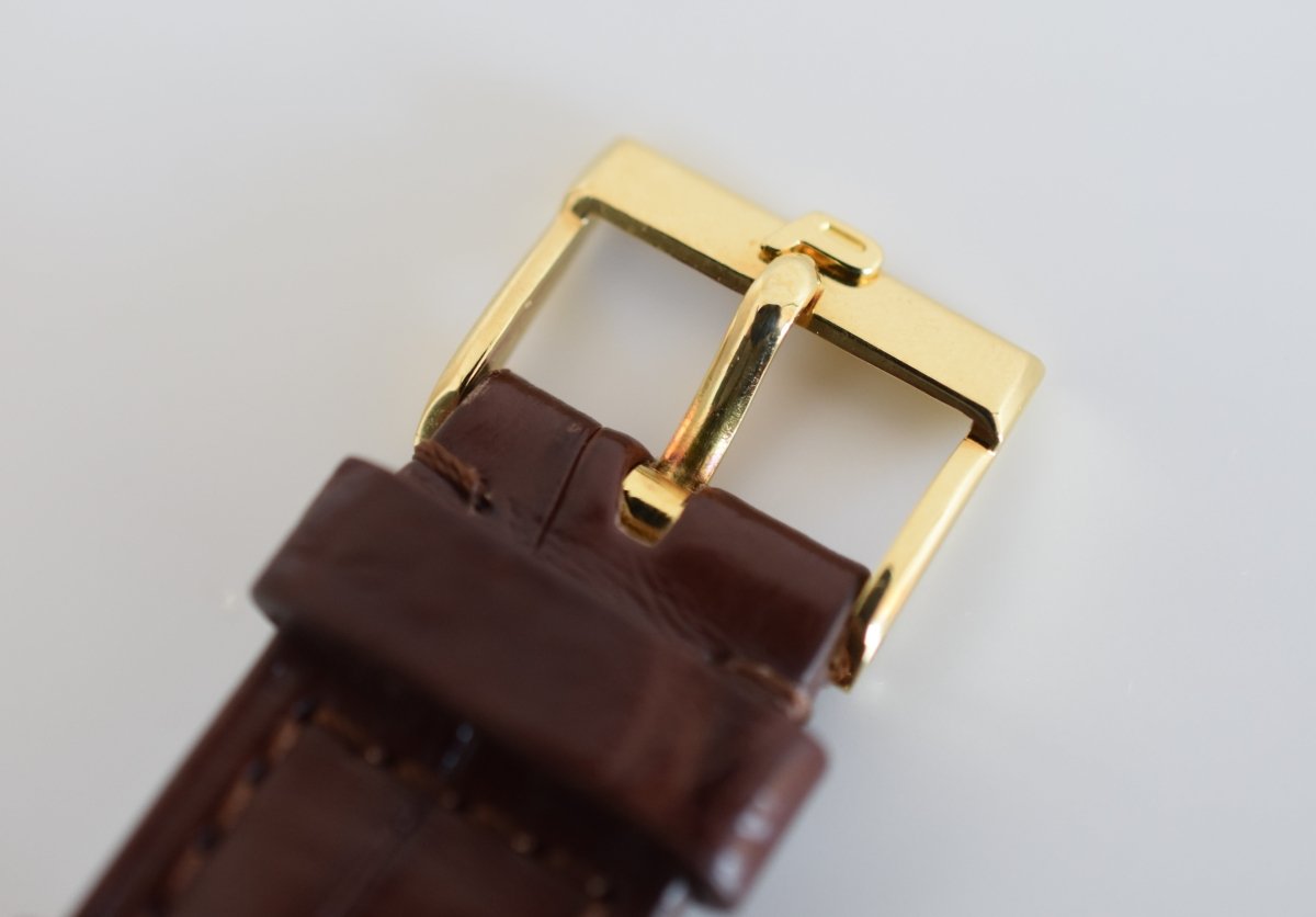 Montre PIAGET "Coussin" en or jaune et cuir - Castafiore