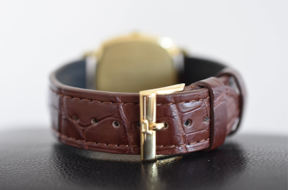 Montre PIAGET "Coussin" en or jaune et cuir - Castafiore