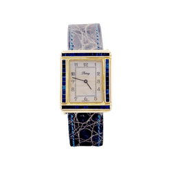 Montre POIRAY "Ma Première" en or jaune, nacre, cuir et saphirs - Castafiore