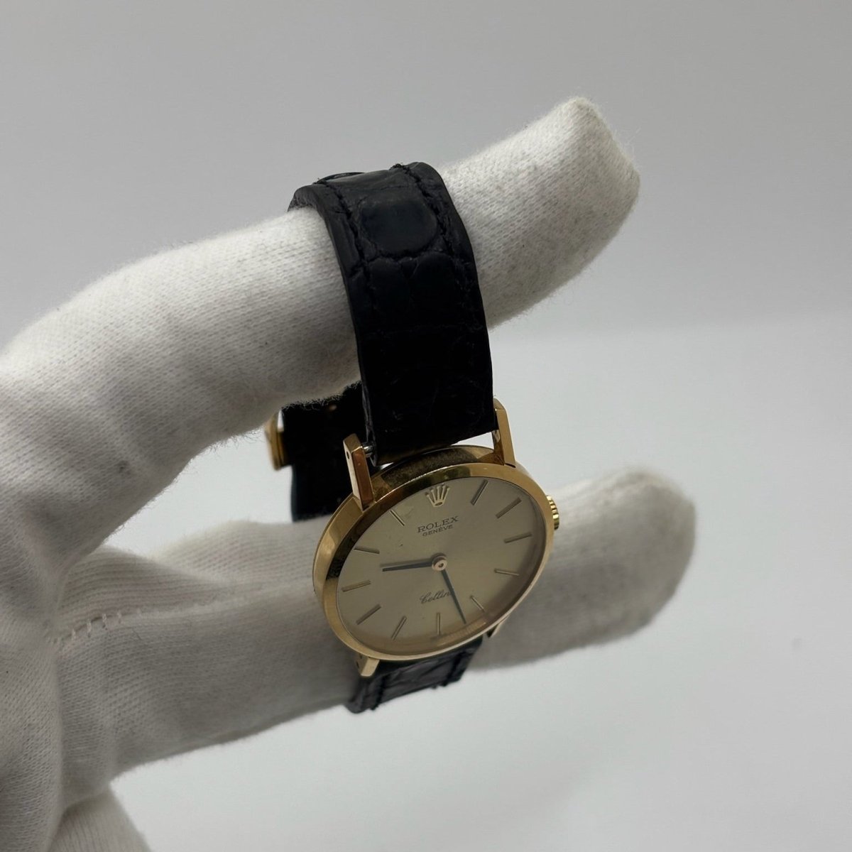 Montre ROLEX "Cellini" en or jaune, acier et cuir - Castafiore