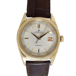 Montre ROLEX "Oyster Perpetual Date Ovettone" en or jaune et cuir - Castafiore