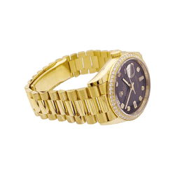 Montre ROLEX "Oyster perpetual day-date" en or jaune et diamants - Castafiore