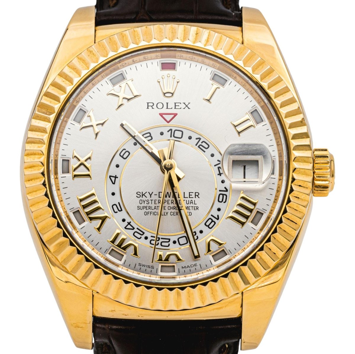 Montre ROLEX "Sky - Dweller" en or jaune, argent, cuir et saphir - Castafiore