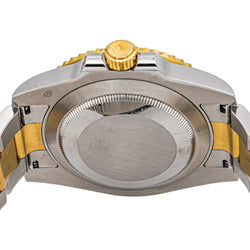 Montre ROLEX "Submariner Date" en or jaune, saphir et acier - Castafiore