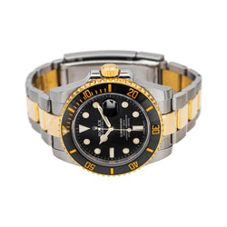 Montre ROLEX "Submariner Date" en or jaune, saphir et acier - Castafiore