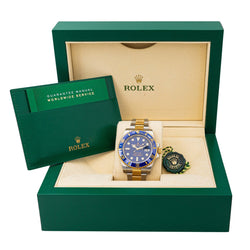 Montre ROLEX "Submariner" en or jaune et acier - Castafiore