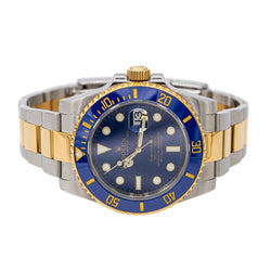 Montre ROLEX "Submariner" en or jaune et acier - Castafiore