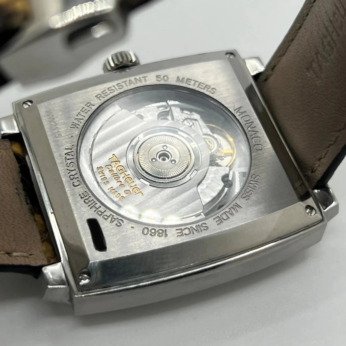 Montre TAG HEUER "Monaco Calibre 6" en acier inoxydable et cuir - Castafiore