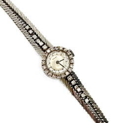 Montre TISSOT cocktail en or gris et diamant - Castafiore